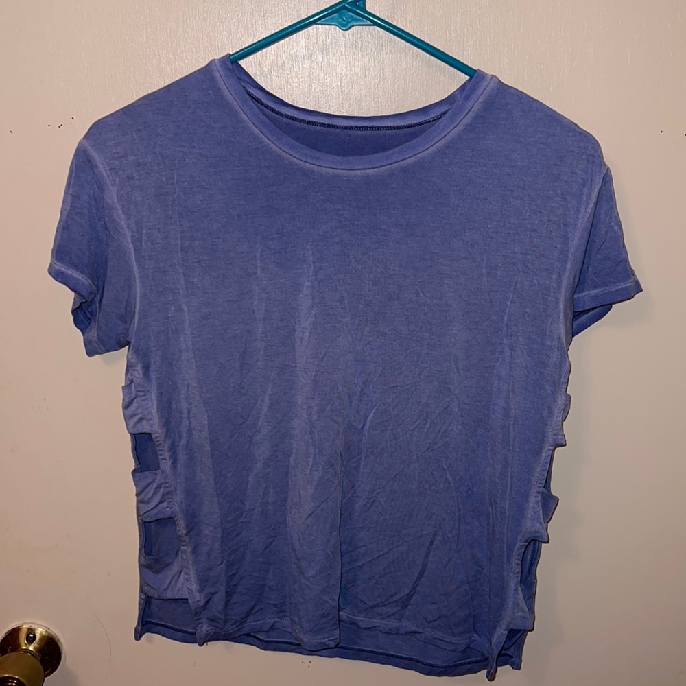 Blue short sleeve top with side cut outs